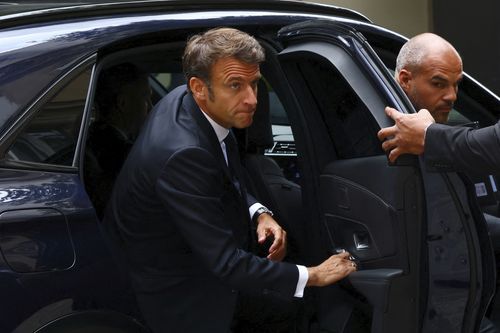 French President Emmanuel Macron arrives to attend a government emergency meeting after riots erupted for the third night in a row across the country, in Paris, Friday, June 30, 2023. 