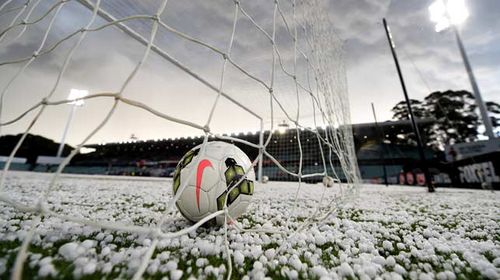 A freak hailstorm also swept through the ground before kick-off. (AAP)