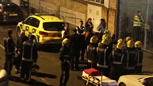 A photo taken by a bystanders shows emergency service workers gathered outside the club. (Twitter/@PhieMcKenzie)