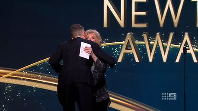 Hamish Blake accepts Bert Newton award during 2022 Logies.