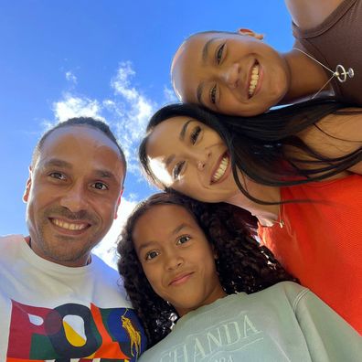 Kat Clark with her husband and daughters.