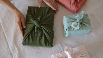 Gifts wrapped in fabric