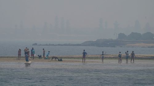 Smoke haze from bushfires is seen at Brighton Beach in Melbourne, Friday, January 3, 202