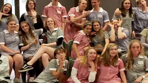 A group of school students featured in the 'Do It In A Dress' video. 