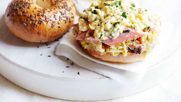 Caraway seed bagels with hot-smoked trout, buttered leeks and scrambled eggs
