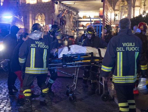 Emergency crews outside the station in central Rome.