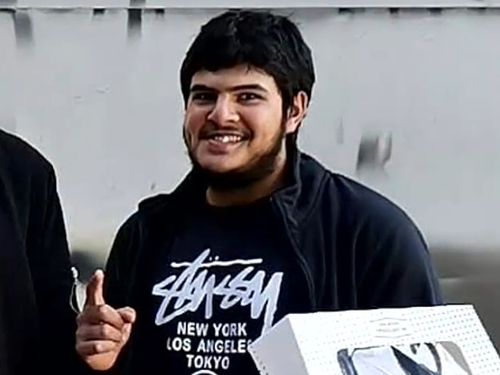 Naveed Akram (far right).