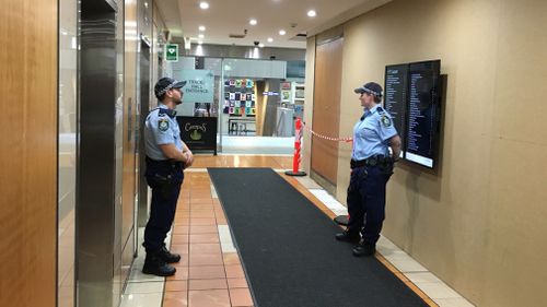 Police at the AWU's Sydney office yesterday. (9NEWS)