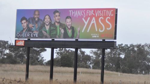 A huge billboard has been erected on the Barton Highway featuring the Fab Five. (Supplied)