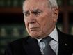 Former Prime Minister John Howard honours the Queen after her death at a press conference.