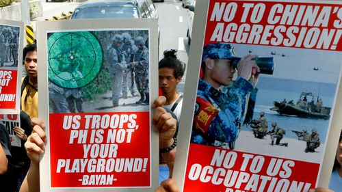 China's military build-up in the South China Sea has sparked protests in neighbouring countries such as the Philippines. (Photo: AP).
