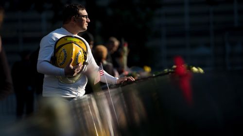 James Taormina, whose brother Dennis was killed in the 9/11 attacks, pauses at the memorial in New York. (AFP)