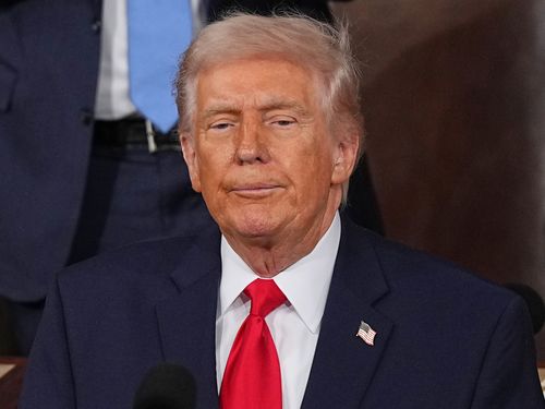 President Donald Trump pauses after delivering the State of the Union address to a joint session of Congress in the House chamber at the U.S. Capitol in Washington, Tuesday, Feb. 24, 2026. (AP Photo/Matt Rourke)