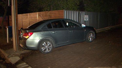 The car struck a gas pipe when the driver allegedly tried to flee.