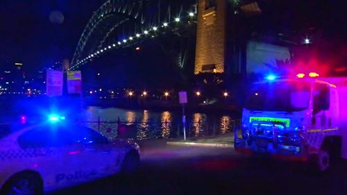 Man fighting for life after plunging down rock face near Sydney's Harbour Bridge