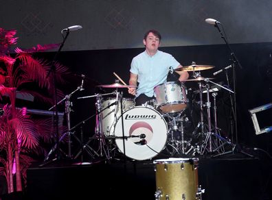 Graham Sierota performing, drums, on stage, band Echosmith