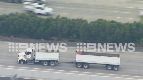 Police have taken a driver into custody after a truck was seen allegedly driving dangerously and swerving at cars on a Queensland highway this afternoon.