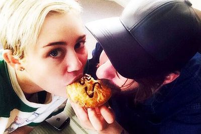 Miley Cyrus and her personal assistant BFF Cheyne Thomas took a break from their busy Aussie tour to scoff down a good old fashioned pie in Sydney. Nom!<br/><br/>"Lady & The Tramp," she captioned the snap. "Guess which is which @cheythom."