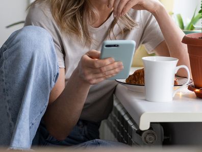 Woman listening to podcast