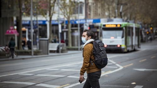 The public are seen wearing face-masks due to the Covid-19 pandemic in Melbourne CBD. 