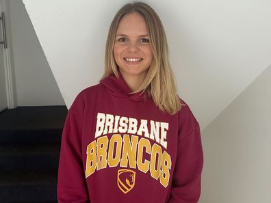 Jessi is wearing her Brisbane Broncos hoodie from Kmart