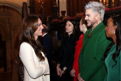 LONDON, ENGLAND - DECEMBER 08: Catherine, Princess of Wales speaks with Adam Lambert at The "Together At Christmas" Carol Service at Westminster Abbey on December 08, 2023 in London, England. Spearheaded by The Princess of Wales, and supported by The Royal Foundation, the service is a moment to bring people together at Christmas time and recognise those who have gone above and beyond to help others throughout the year. (Photo by Chris Jackson/Getty Images)