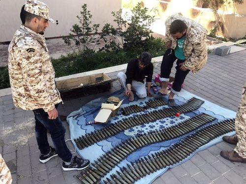 Fighters of a Misurata-based armed group, loyal to the UN-backed Government of National Accord of Fayez Serraj, prepare their ammunition before heading to the front line as battles (Photo by Stringer/picture alliance via Getty Images)