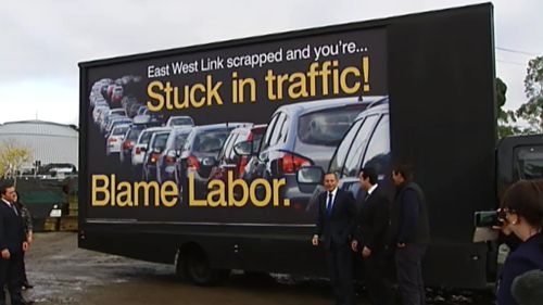 Victorian Premier Daniel Andrews calls out Prime Minister Tony Abbott over blame billboard