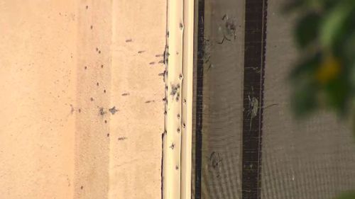 Shots were fired into the window. (Image: 9NEWS)