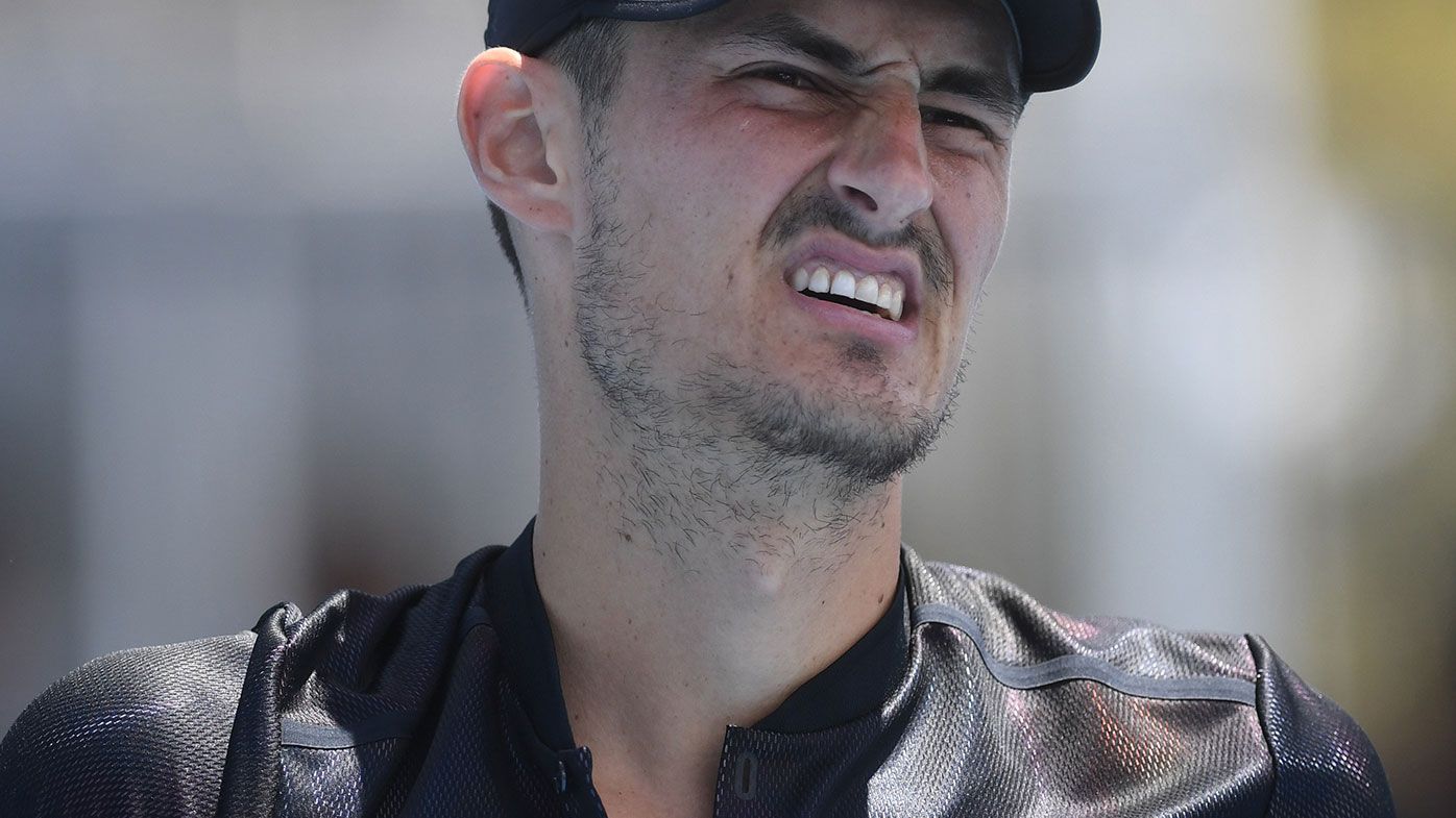Tomic curt after first-up French Open exit