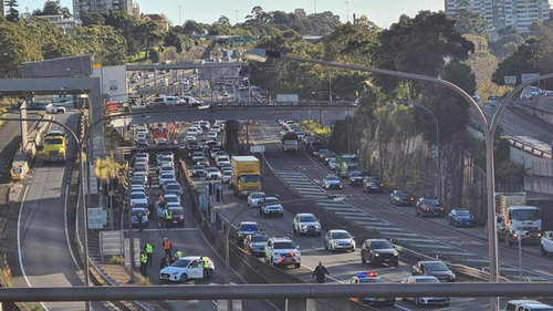 Traffic quickly banked up after climate protesters blocked the Sydney Harbour Tunnel. 