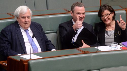 Palmer United Party leader Clive Palmer (left), leader of the house Chris Pyne and independent MP Cathy McGowan during House of Representatives question time at Parliament House Canberra on July 15, 2014.