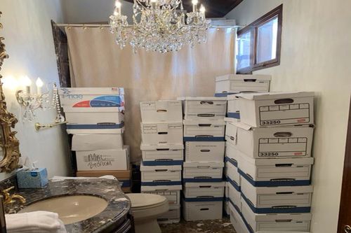 This image, contained in the indictment against former President Donald Trump, shows boxes of records stored in a bathroom and shower in the Lake Room at Trump's Mar-a-Lago estate in Palm Beach, Fla.  