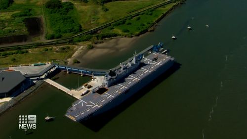 The HMAS Adelaide Navy ship has docked in Brisbane, ready to be loaded with humanitarian aid bound for disaster-stricken Tonga after what was likely the world's biggest volcanic eruption in 30 years.