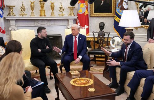 US President Donald Trump (C) and Vice President JD Vance meet with Ukrainian President Volodymyr Zelenskyy in the Oval Office.