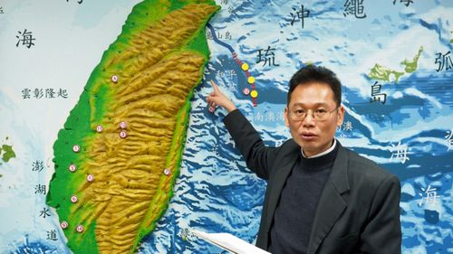 Chen Kuo-chang, acting director of the Seismological Observation Center, briefs reporters on a flurry of earthquakes which have struck off Taiwan's east coast. (Photo: AAP).