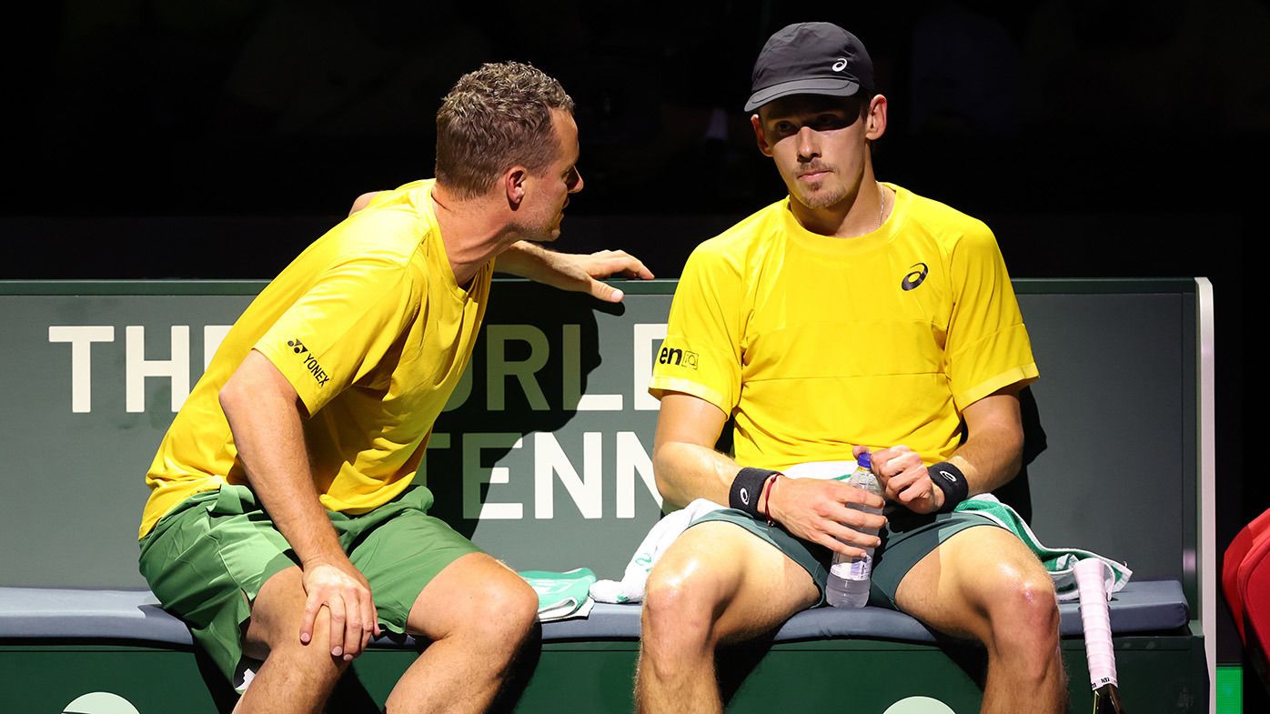 Lleyton Hewitt speaks to Alex De Minaur of Australia during the Davis Cup Final match against Italy at Palacio de Deportes Jose Maria Martin Carpena on November 26, 2023 in Malaga, Spain. (Photo by Clive Brunskill/Getty Images for ITF)