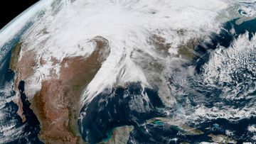 A handout picture made available by the National Oceanic and Atmospheric Administration (NOAA) winter storm Ulmer becoming a &quot;bomb cyclone&quot; over the central US.