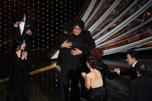 Bong Joon-ho accepts the Best Picture award for Parasite onstage during the 92nd Annual Academy Awards at Dolby Theatre on February 09, 2020 in Hollywood, California