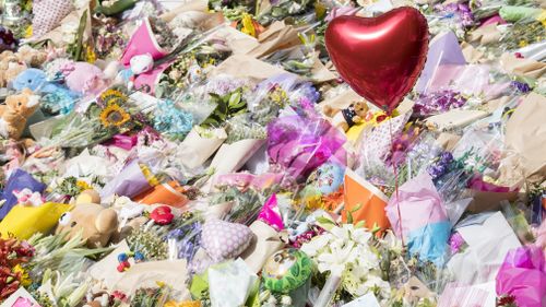 The site of the attack was inundated with floral tributes in the days following. (Getty)