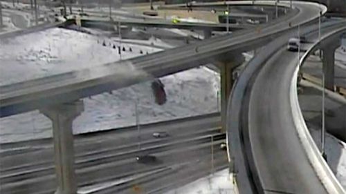 A Wisconsin driver is lucky to be alive after plunging off a highway overpass.