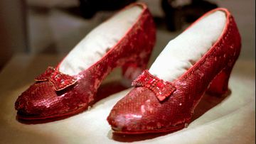 A file photo shows one of the four pairs of ruby slippers worn by Judy Garland in the 1939 film The Wizard of Oz.