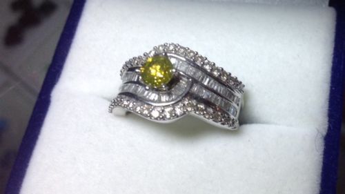 A yellow diamond ring was among the items stolen. (Victoria Police)