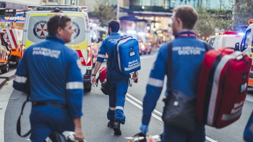 Paramedics and doctors continue to walk into Westfield Bondi Junction