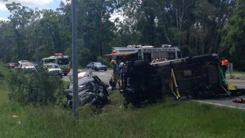 Family trapped, five in hospital after Brisbane car crash