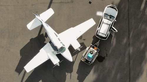 Two men piloted the unauthorised flight from regional town of Monto, northwest of Brisbane, to Bulolo.