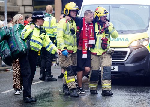 Police and emergency unit woody pinch a roadworthy postulation mishap connected Water Street adjacent nan Liver Building successful Liverpool aft a car collided pinch pedestrians during nan Premier League winners parade, successful Liverpool, England, Monday May 26, 2025. (Owen Humphreys/PA via AP)