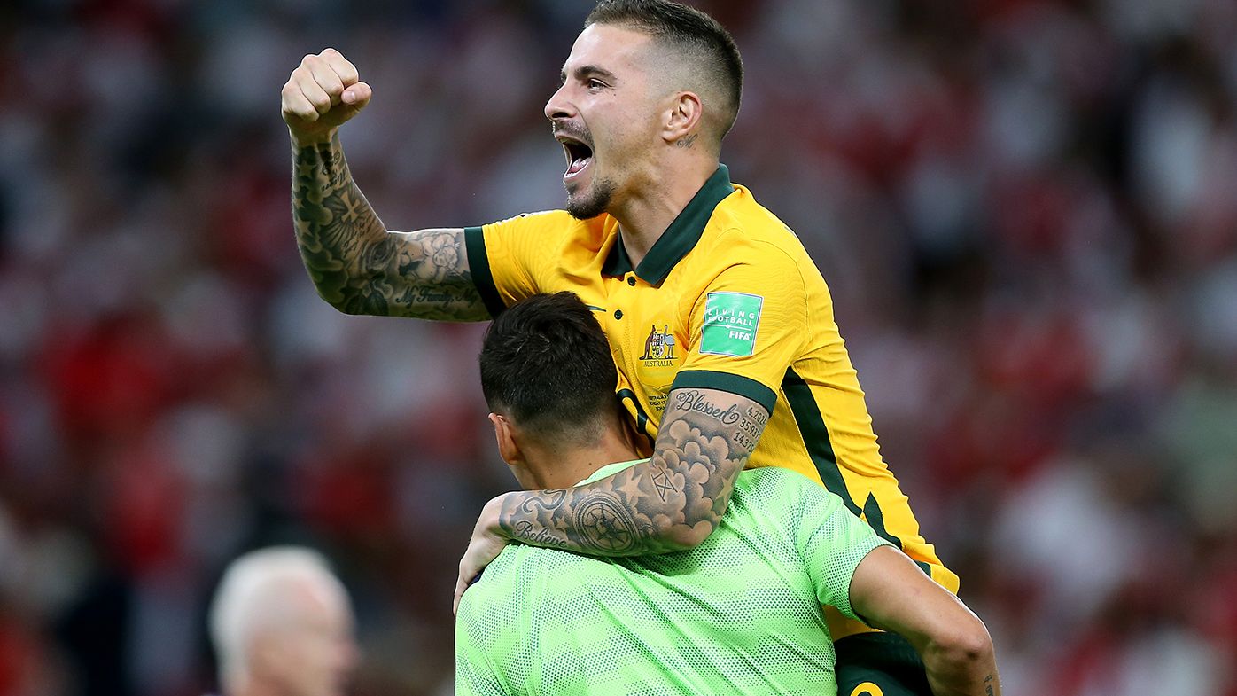 Jamie Maclaren of Australia celebrates following the Socceroos&#x27; victory in the 2022 FIFA World Cup Playoff against Peru.