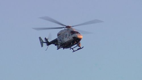 The search is being carried out by land, air and water. Picture: 9NEWS