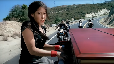 Vanessa Carlton in the music video for A Thousand Miles (2002)